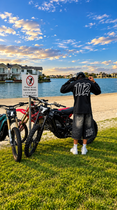 112 Hoodie and Denim Jorts worn by the water